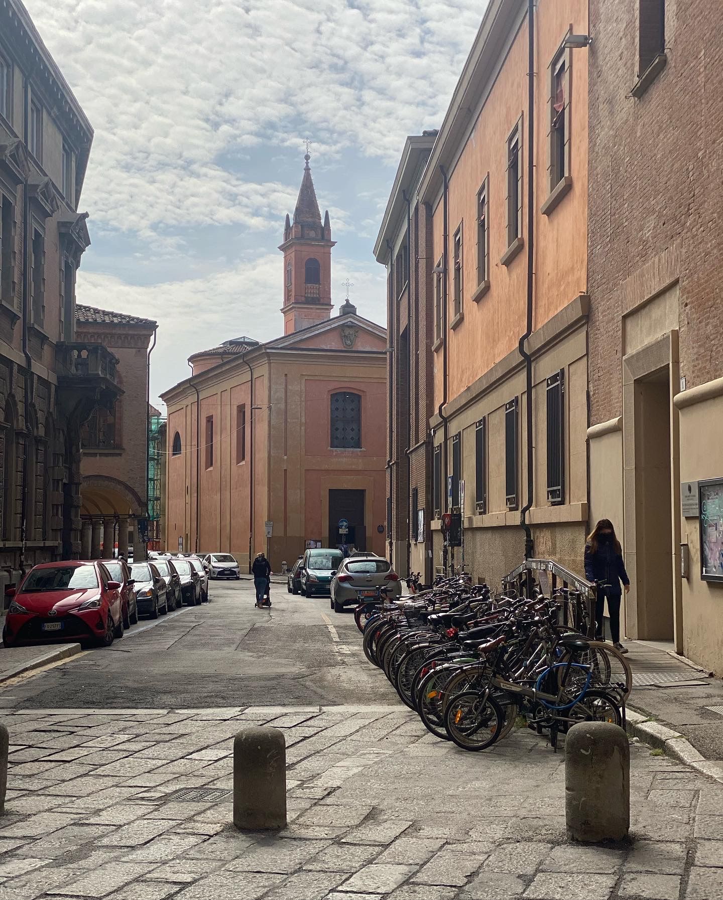 A street in Bologna with bicycles and porticoes