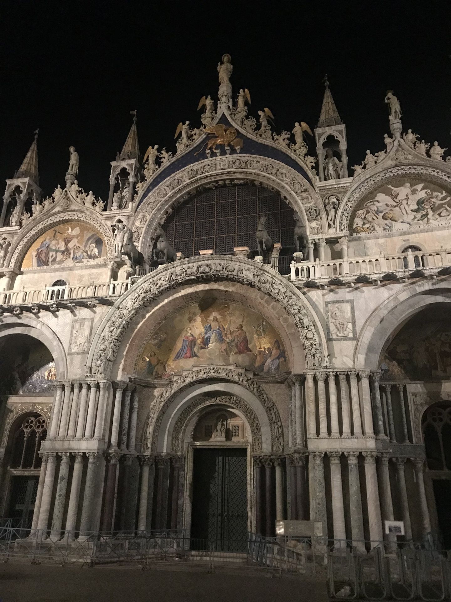 The Byzantine facade of St Mark's Basilica with its golden mosaics